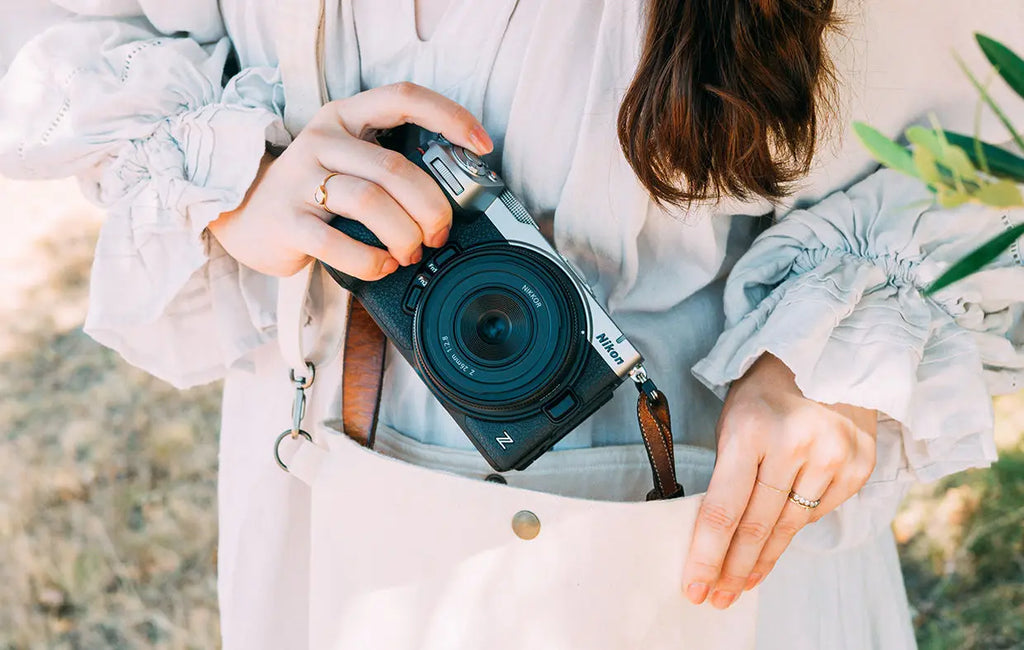 Nikon Z5IIC silver mirrorless camera with NIKKOR Z lens in a compact travel photography setup