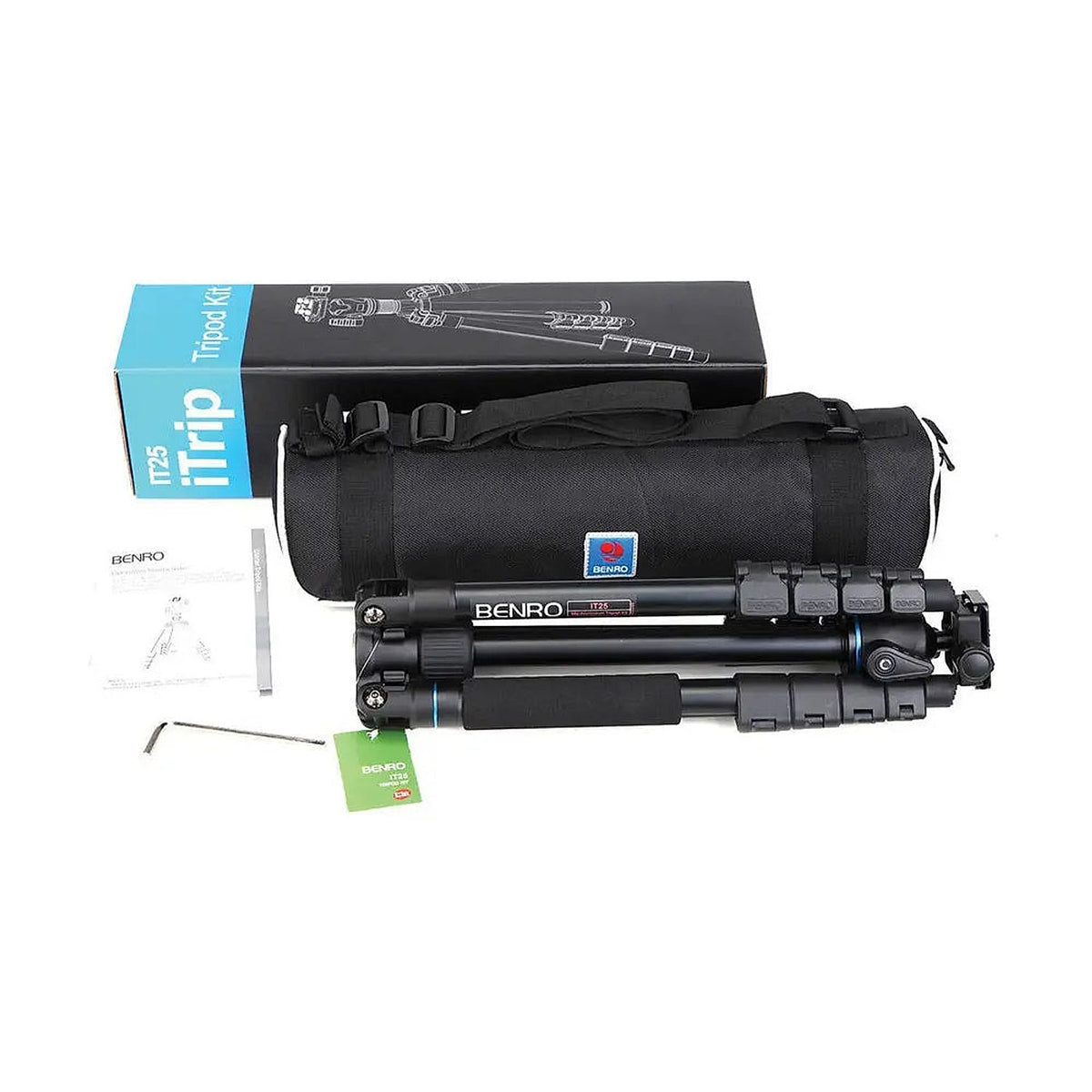 Benro iTrip IT25 black travel tripod kit, showing the folded tripod, carrying bag, retail box and supplied accessories.