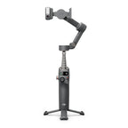 DJI Osmo Mobile 7P smartphone gimbal with built-in extension rod and tripod on white background