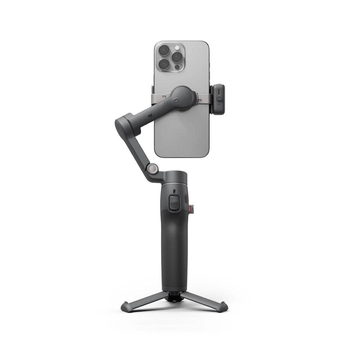 DJI Osmo Mobile 8 gimbal side view holding smartphone on built-in tripod
