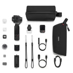 DJI Osmo Pocket 4P Vlog Combo complete accessories arranged on white, including remote, microphone and charging cables