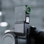 DJI RS Enhanced Intelligent Tracking Module mounted on a compatible RS gimbal showing green tracking status ring