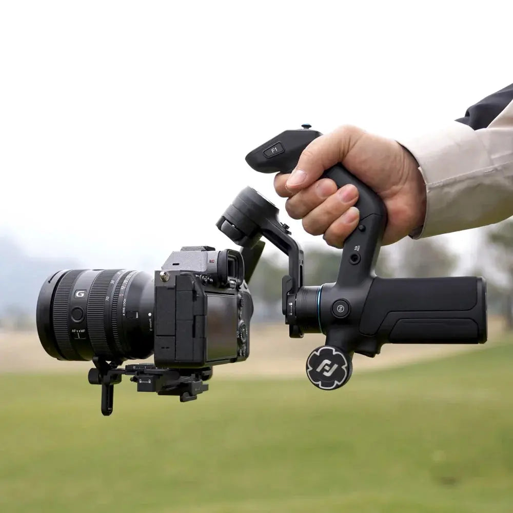 FeiyuTech SCORP Mini 3 Pro gimbal handheld with mirrorless camera for demonstration; camera not included