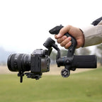 FeiyuTech SCORP Mini 3 Pro gimbal handheld with mirrorless camera for demonstration; camera not included