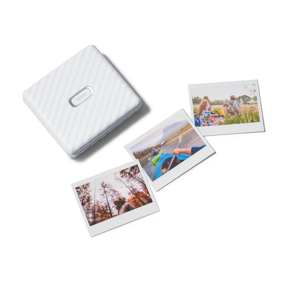 Fujifilm instax Link WIDE Ash White printer alongside example wide-format instant photos