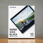 Fujifilm instax WIDE Black 10-shot instant film box front photographed on tabletop