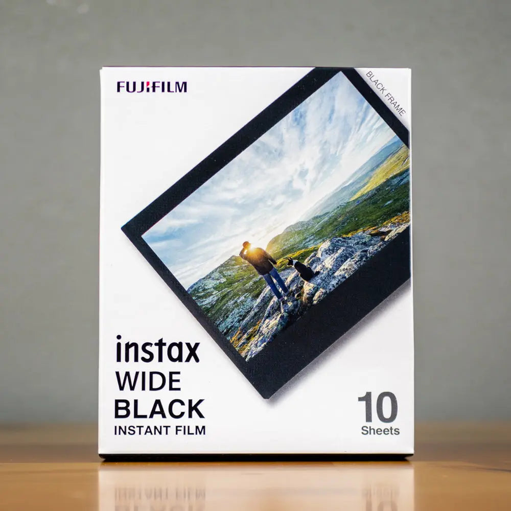 Fujifilm instax WIDE Black 10-shot instant film box front photographed on tabletop