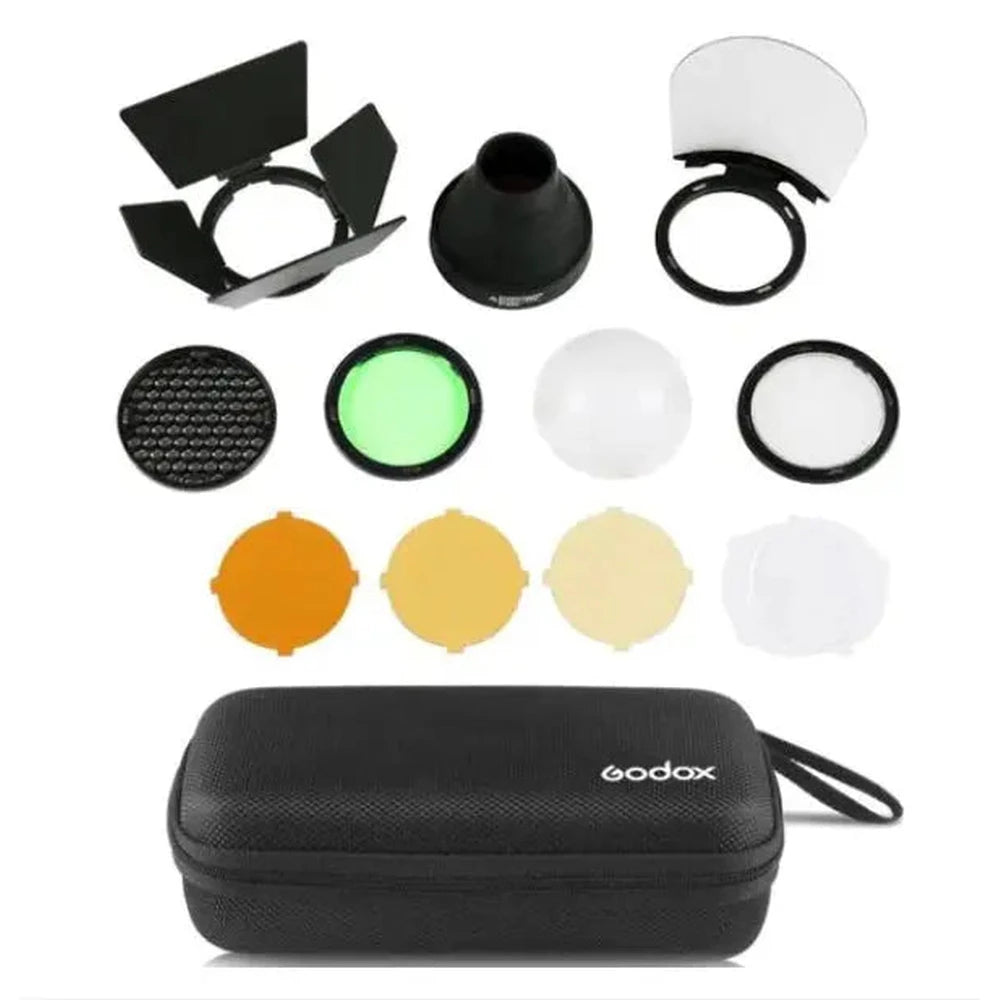 Godox AK-R1 magnetic modifier kit components including diffuser, snoot, filters, grid and carrying case