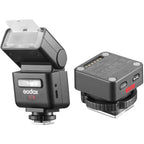 Godox iT32 flash tilted upward beside detached X5C Canon TTL magnetic hot-shoe trigger