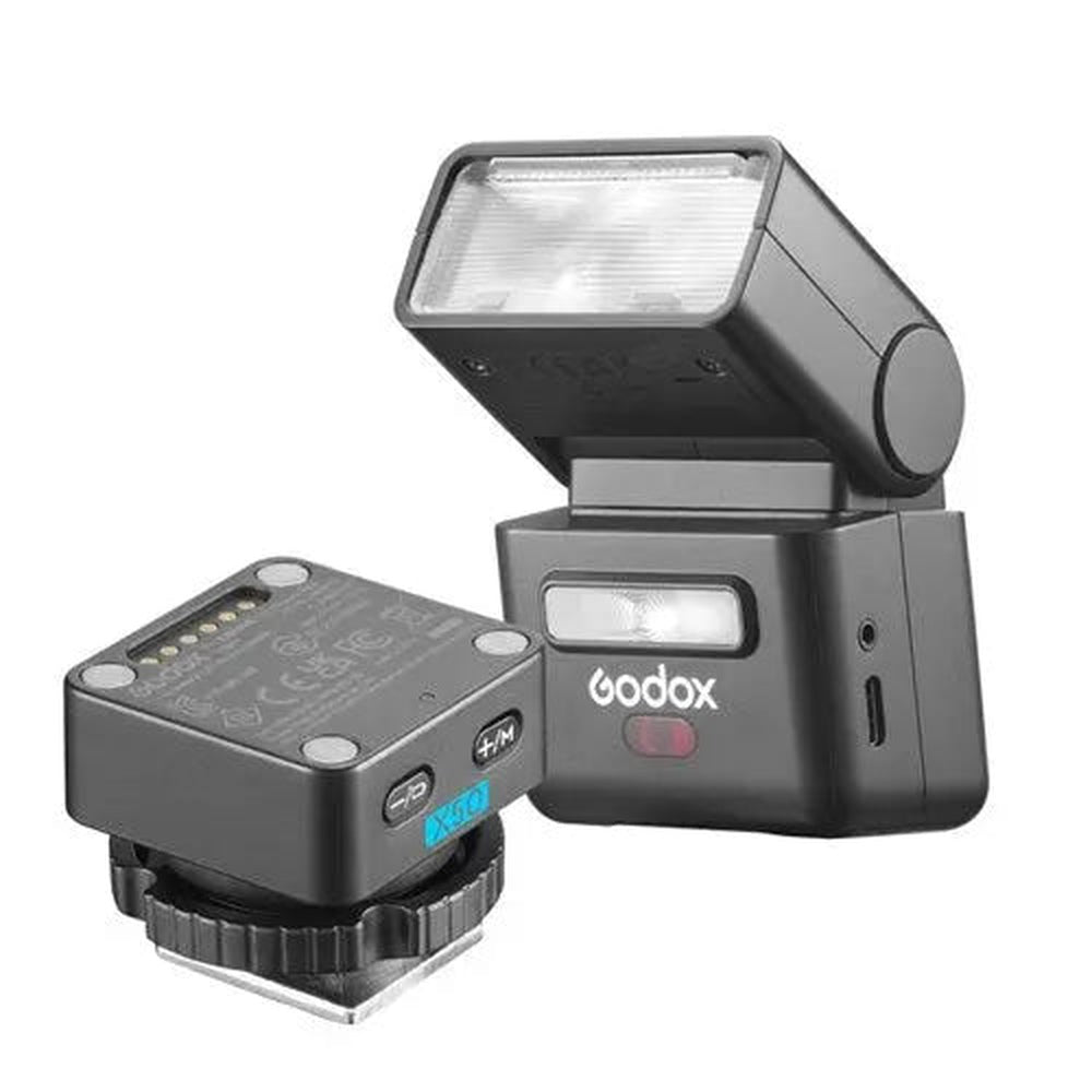 Godox iT32 flash and X5O Olympus Panasonic wireless trigger front three-quarter view