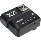 Godox X2T-C Canon wireless flash transmitter three-quarter top view and hotshoe