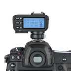 Godox X2T-N Nikon flash trigger mounted on Nikon DSLR camera and showing LCD flash group settings