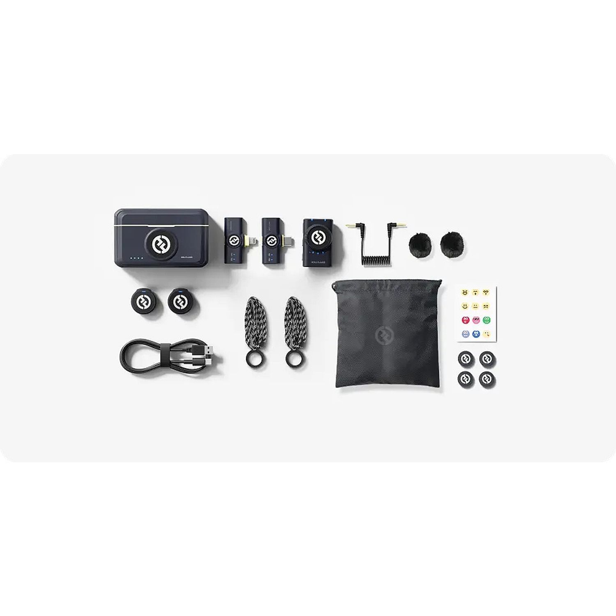 Hollyland LARK M2 Combo complete box contents with two transmitters, three receivers, charging case, windscreens, cables and accessories