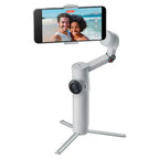 Insta360 Flow 2 Stone Grey smartphone gimbal with built-in tripod deployed