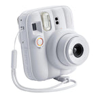 Fujifilm Instax Mini 13 Clay White front three-quarter view and wrist strap