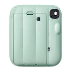 Fujifilm instax mini 13 Lagoon Green rear view showing film door and viewfinder