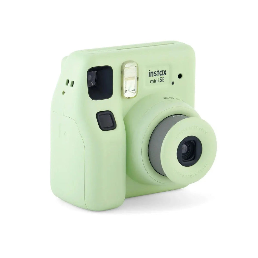 Fujifilm Instax Mini SE green camera front three-quarter view with extended lens