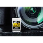 Lexar GOLD 640GB CFexpress Type A memory card photographed beside camera lens