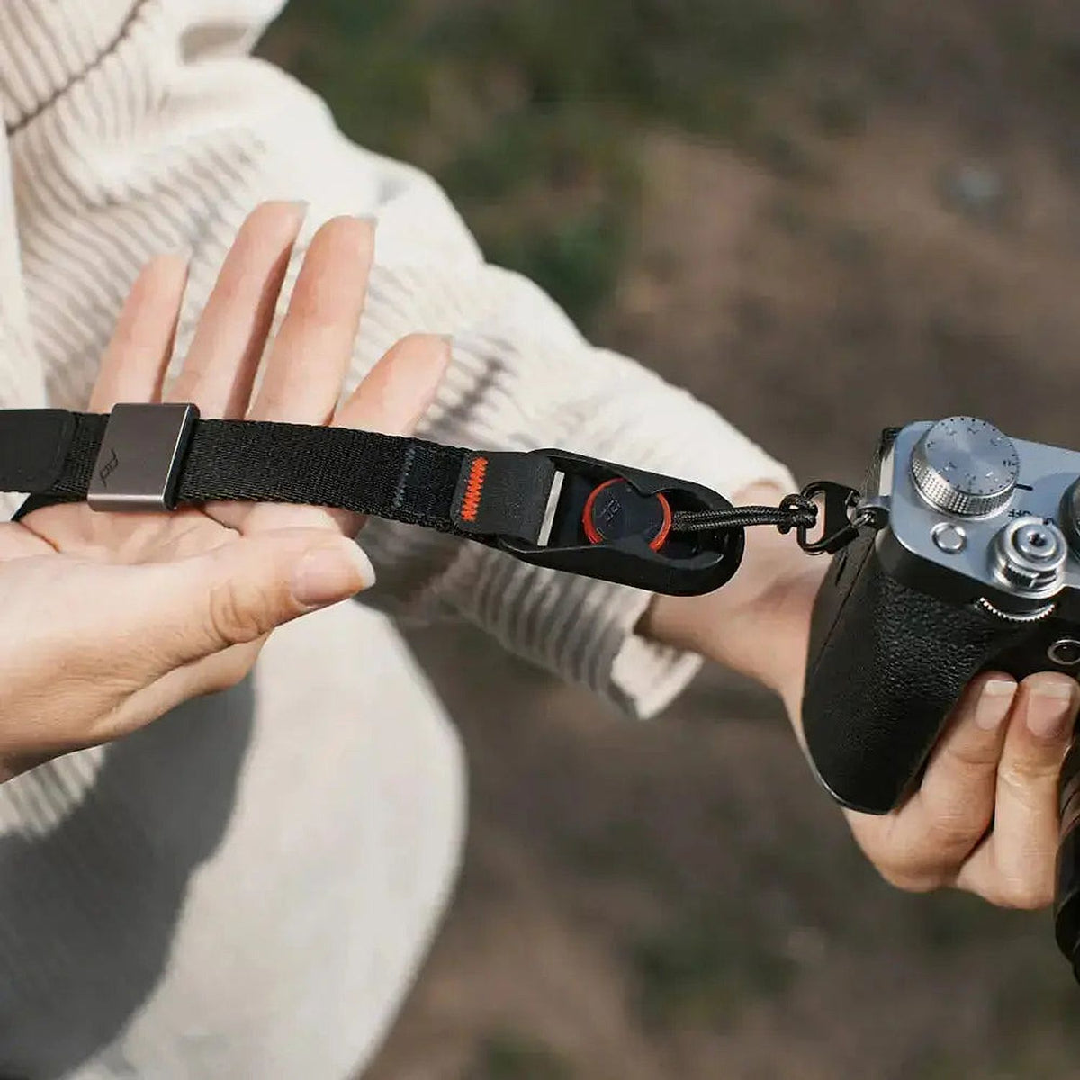 Peak Design Cuff Camera Wrist Strap attached to camera with Anchor Link