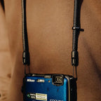 Peak Design Mobile Crossbody Phone Strap attached to compact camera