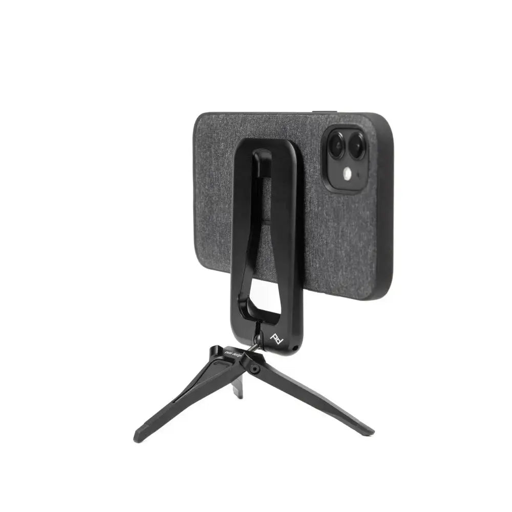 Peak Design Mobile Tripod Magnetic Phone Stand - Black – Mobile Tripod holding a phone in landscape mode on white background