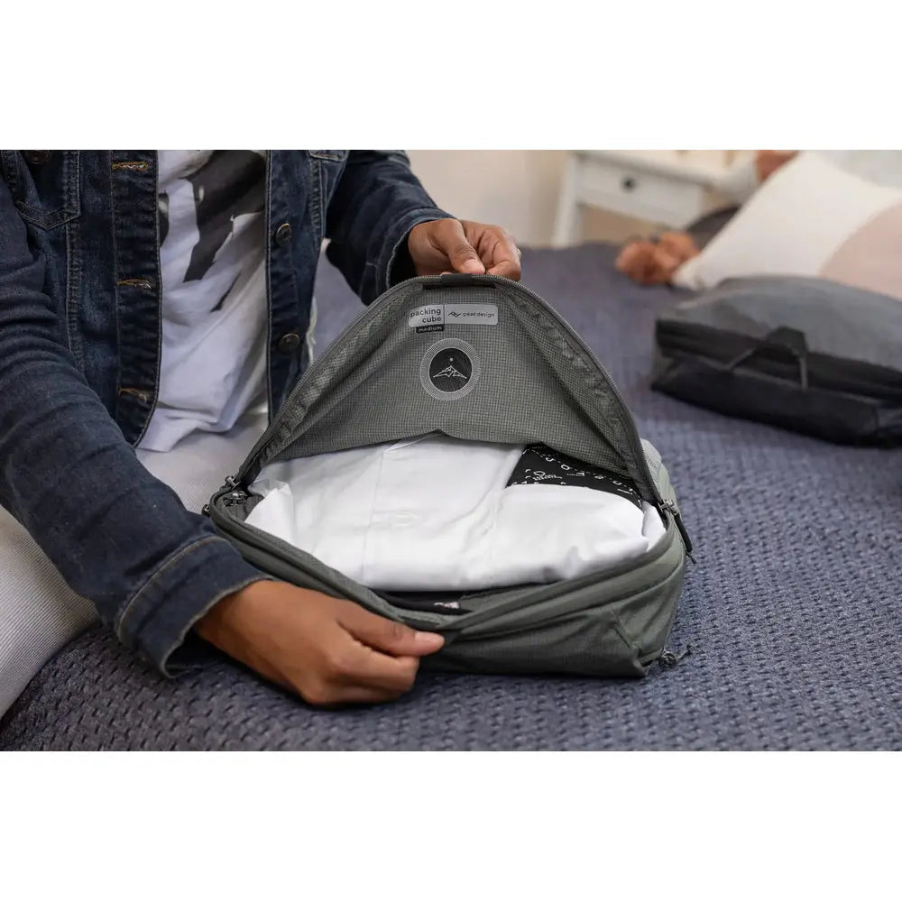 Peak Design Packing Cube Medium Compression Organizer – Packing Cube compression organizer open in use