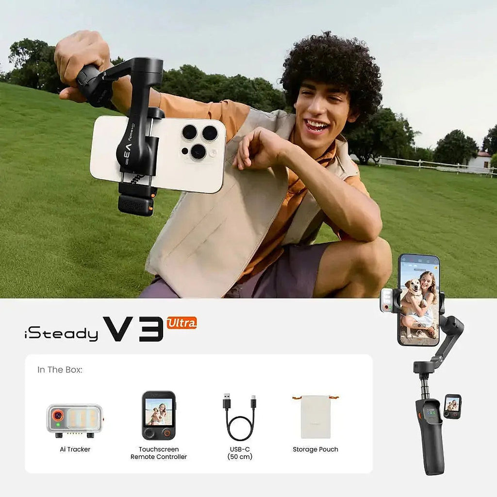A person outdoors on a grassy hill holds a gimbal phone mount with a smartphone attached. The image also includes product text reading 'iSteady V3 Ultra' and a 'In The Box' section showing included accessories: an AI tracker, touchscreen remote controller, USB-C cable, and storage pouch.