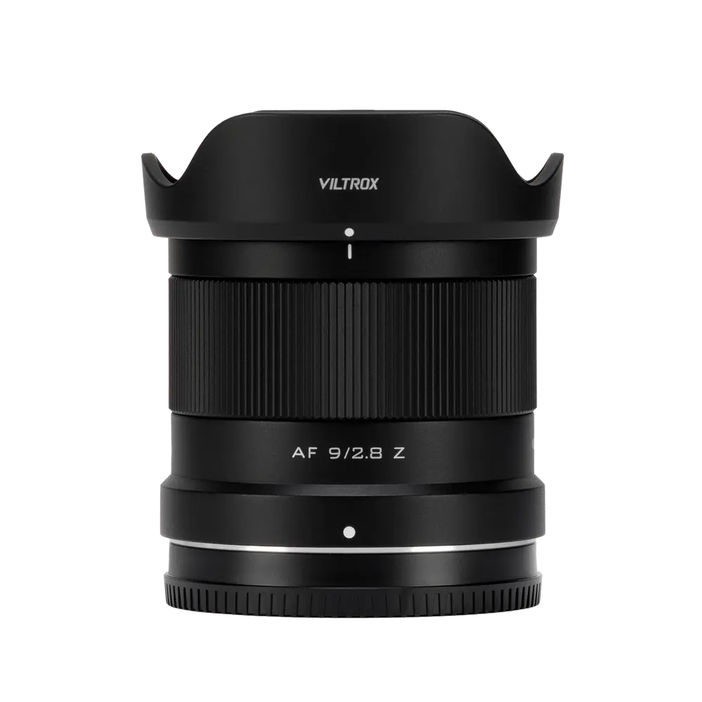 Viltrox AF 9mm f/2.8 Air APS-C lens for Nikon Z-mount, black lens with petal hood upright on plain white background.